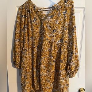 Black, white and orange floral baby doll top. Size large.